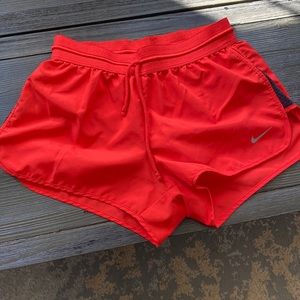 Red Nike dri-fit shorts